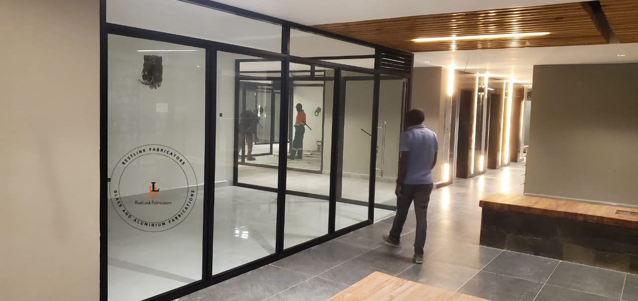 BestLink Fabricators installing glass and aluminium office partitions